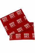 Red bandanas with 'Red Sky Foundation' text on a white background